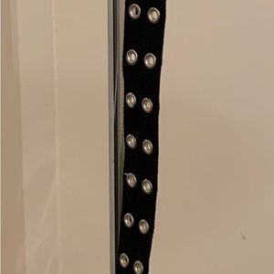 Black belt with silver-look grommets. Almost new!